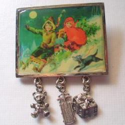 vintage christmas picture pin, children sledding with charm dangles